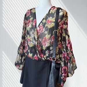 Moody floral wrap top drapes